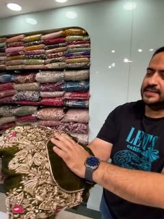 Suit pieces stacked on the store wall